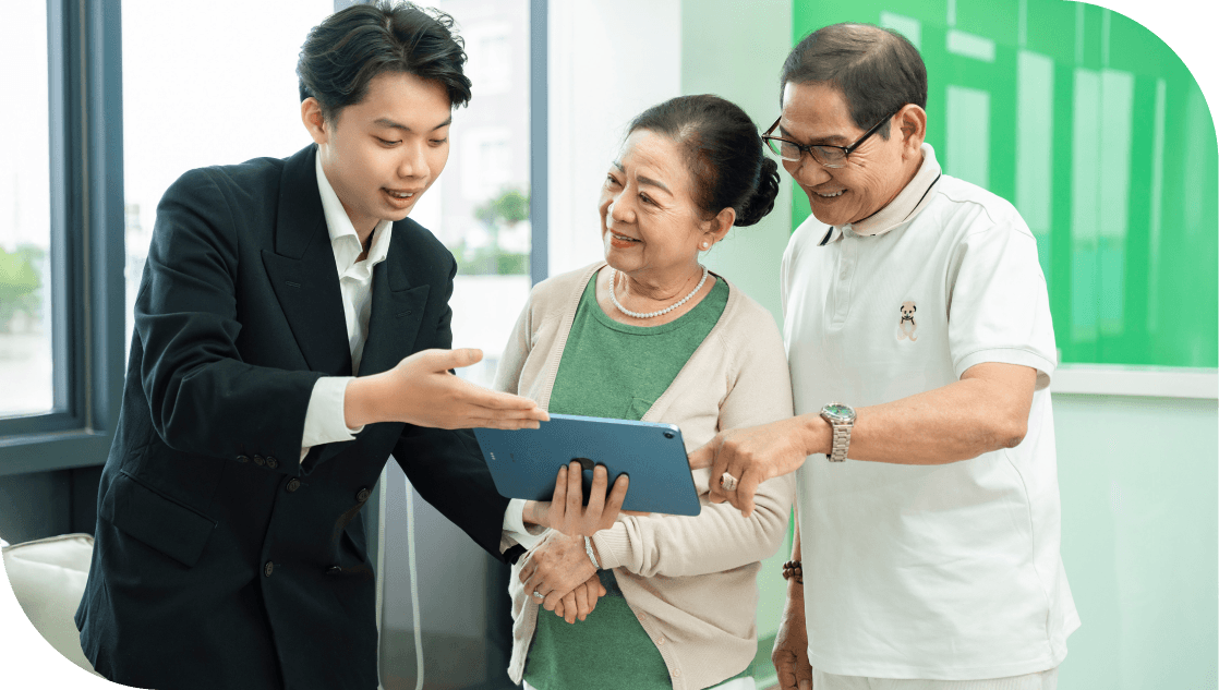 A healthcare professional discussing a plan with an elderly couple